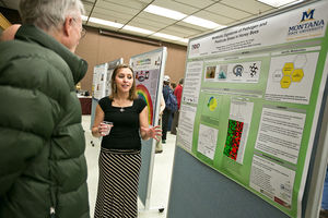 Madison Martin, a senior majoring in microbiology and a McNair Scholar at Montana State University, presents her research on impact of pathogen and pesticides on bees, Tuesday, Dec. 2, at MSU.